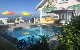 St Leu -Villa d'artiste, superbe vue mer, piscine chauffée